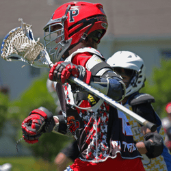 Lacrosse player in full gear during a game